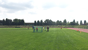 Artificial turf football field of school